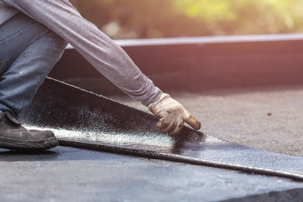 Professional Exterior Waterproofing technician working in Greenvale, NY